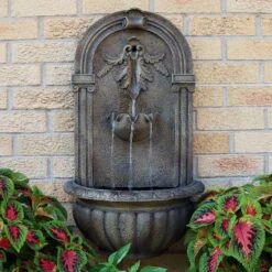 Sunnydaze Decor Sunnydaze Outdoor Florence Solar Wall Fountain With Battery Backup Feature - 27"